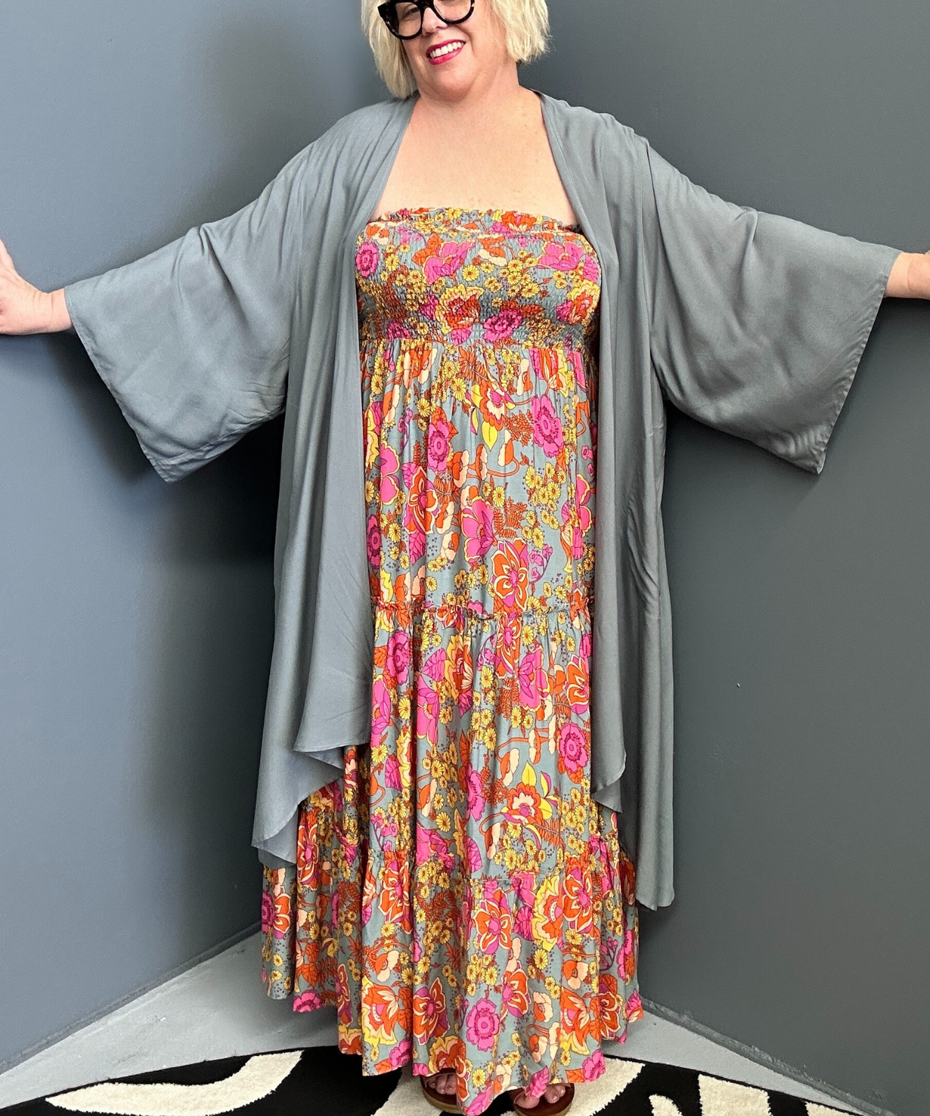 Plus-size sage green maxi dress with a flattering wrap fit and soft flow.