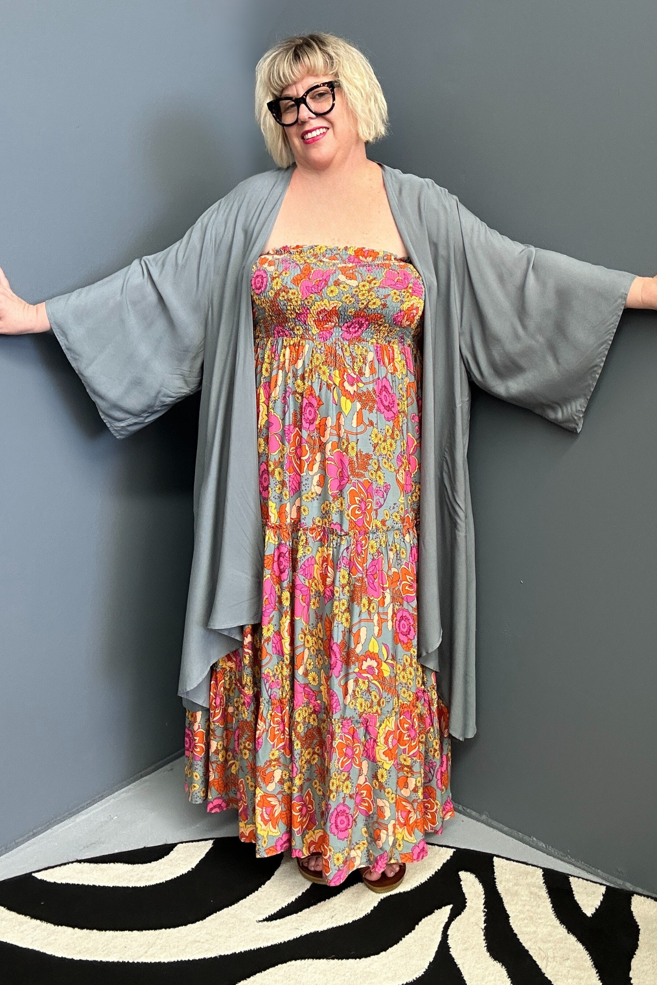 Plus-size sage green maxi dress with a flattering wrap fit and soft flow.