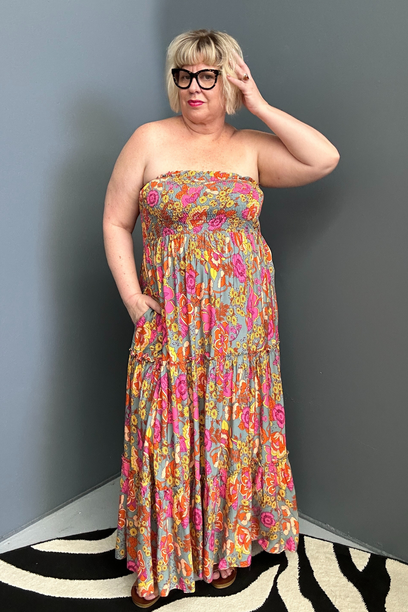 Plus-size sage green maxi dress with a flattering wrap fit and soft flow.