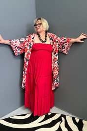 Plus-size red maxi dress with a flattering drape and effortless style.