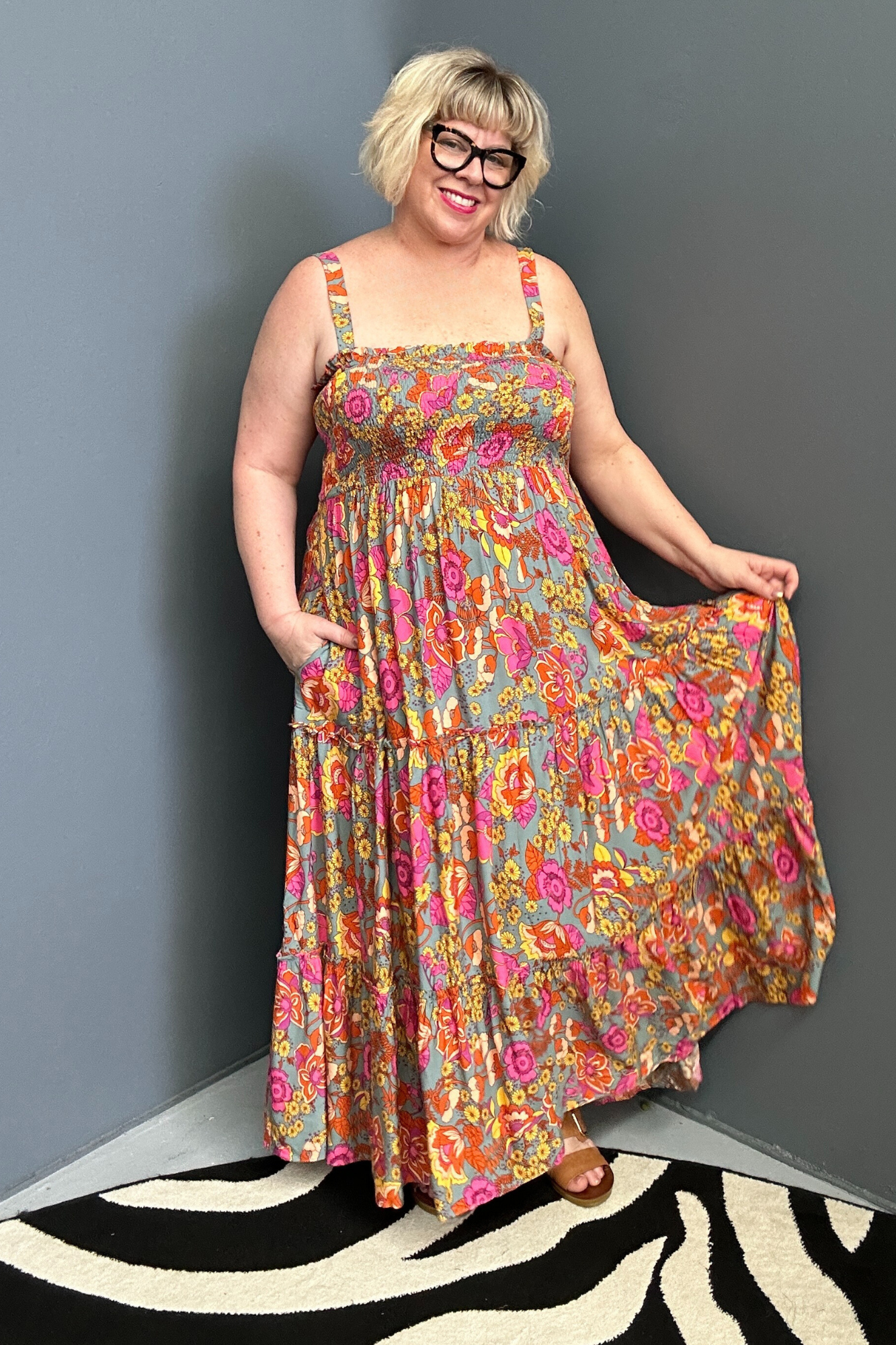 Plus-size sage green maxi dress with a flattering wrap fit and soft flow.