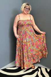 Plus-size sage green maxi dress with a flattering wrap fit and soft flow.