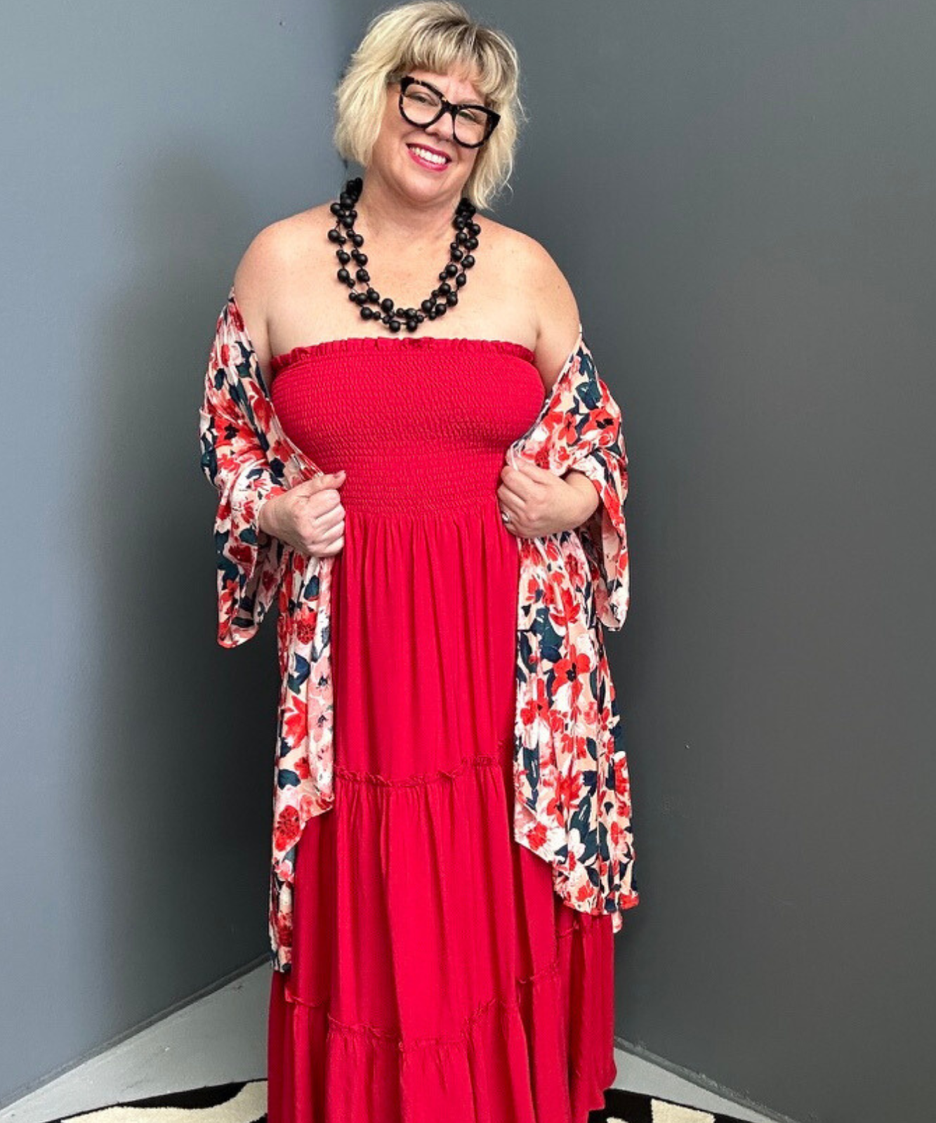 Plus-size red maxi dress with a flattering drape and effortless style.