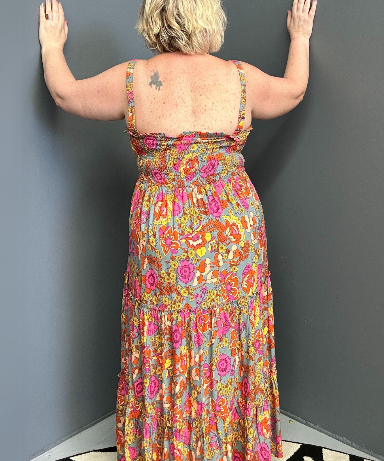 Plus-size sage green maxi dress with a flattering wrap fit and soft flow.