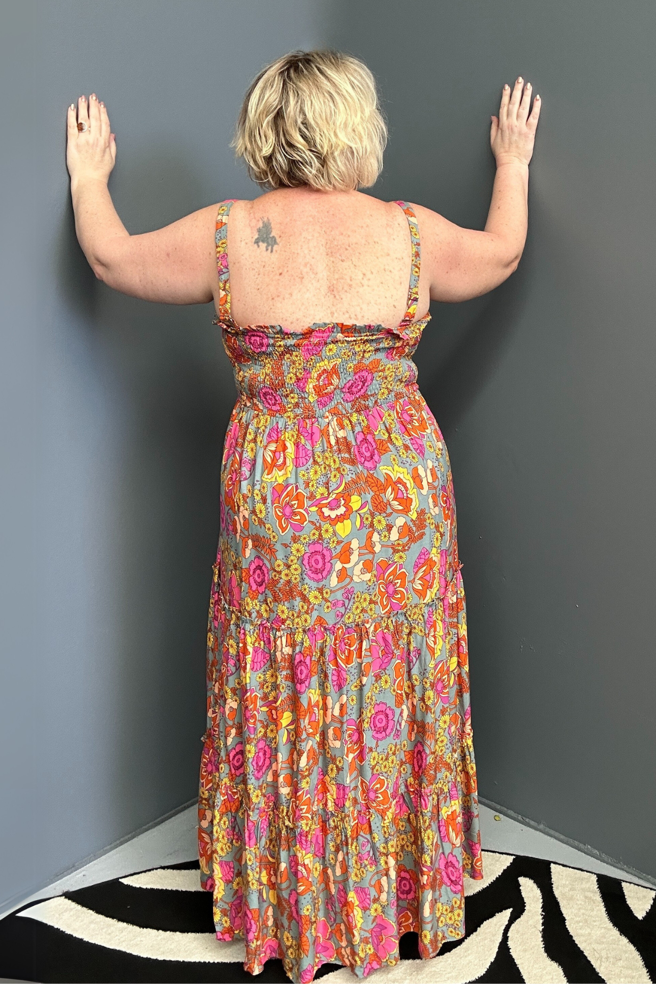 Plus-size sage green maxi dress with a flattering wrap fit and soft flow.
