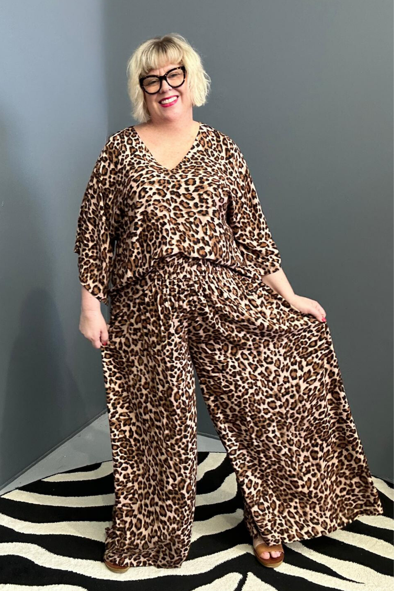 Flowy palazzo pants with a bold leopard print.
