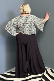 Flowy palazzo pants in a sleek black design.