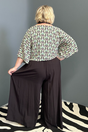 Flowy palazzo pants in a sleek black design.