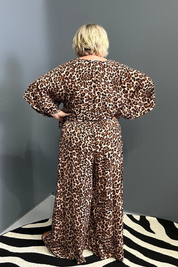 Flowy palazzo pants with a bold leopard print.
