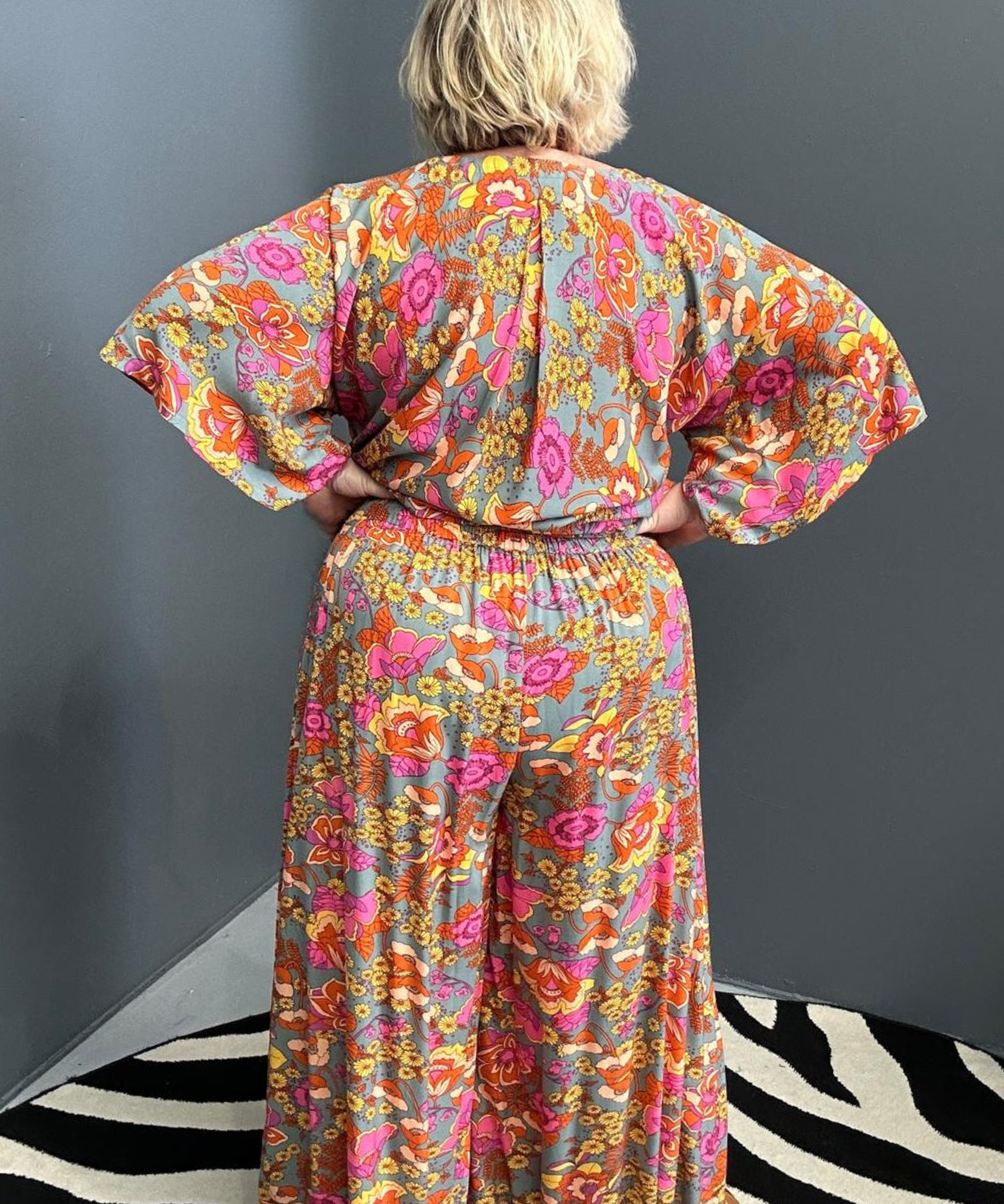 Flowy palazzo pants with a soft Sage Garden print.
