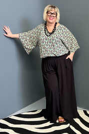 Flowy palazzo pants in a sleek black design.