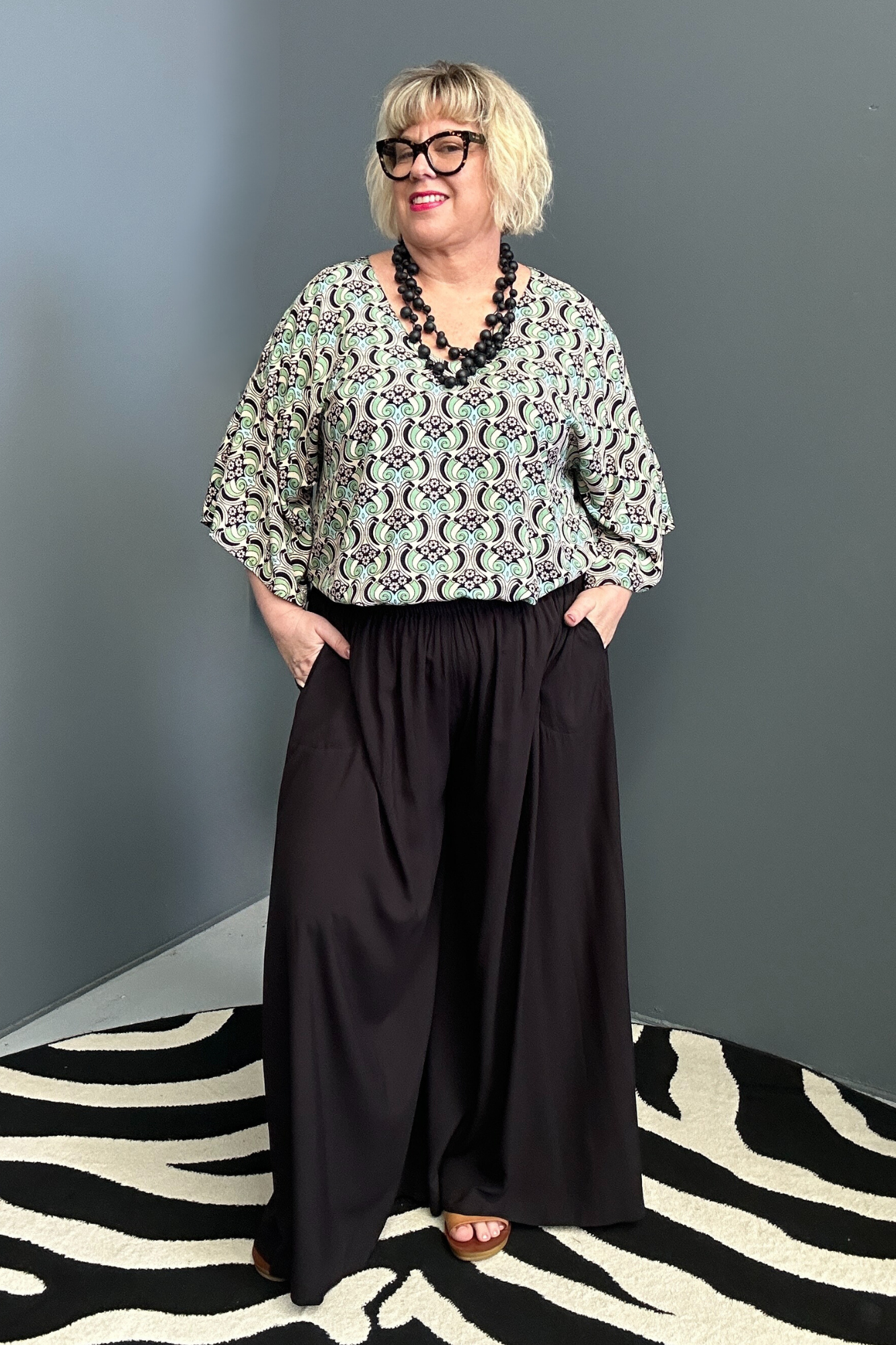 Flowy palazzo pants in a sleek black design.