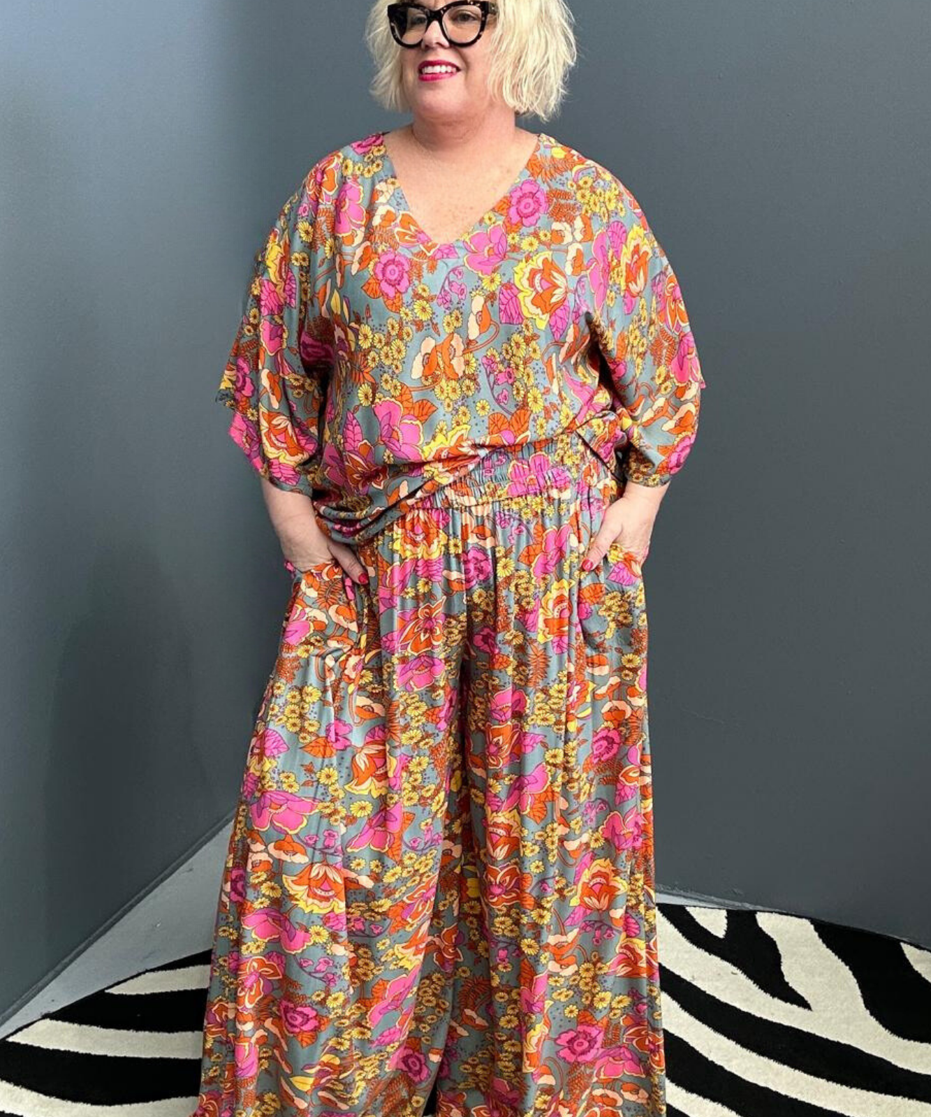 Flowy palazzo pants with a soft Sage Garden print.