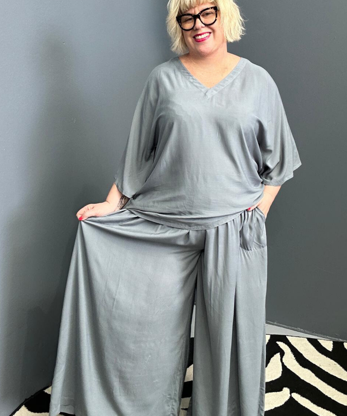 Flowy palazzo pants in a calming sage hue.