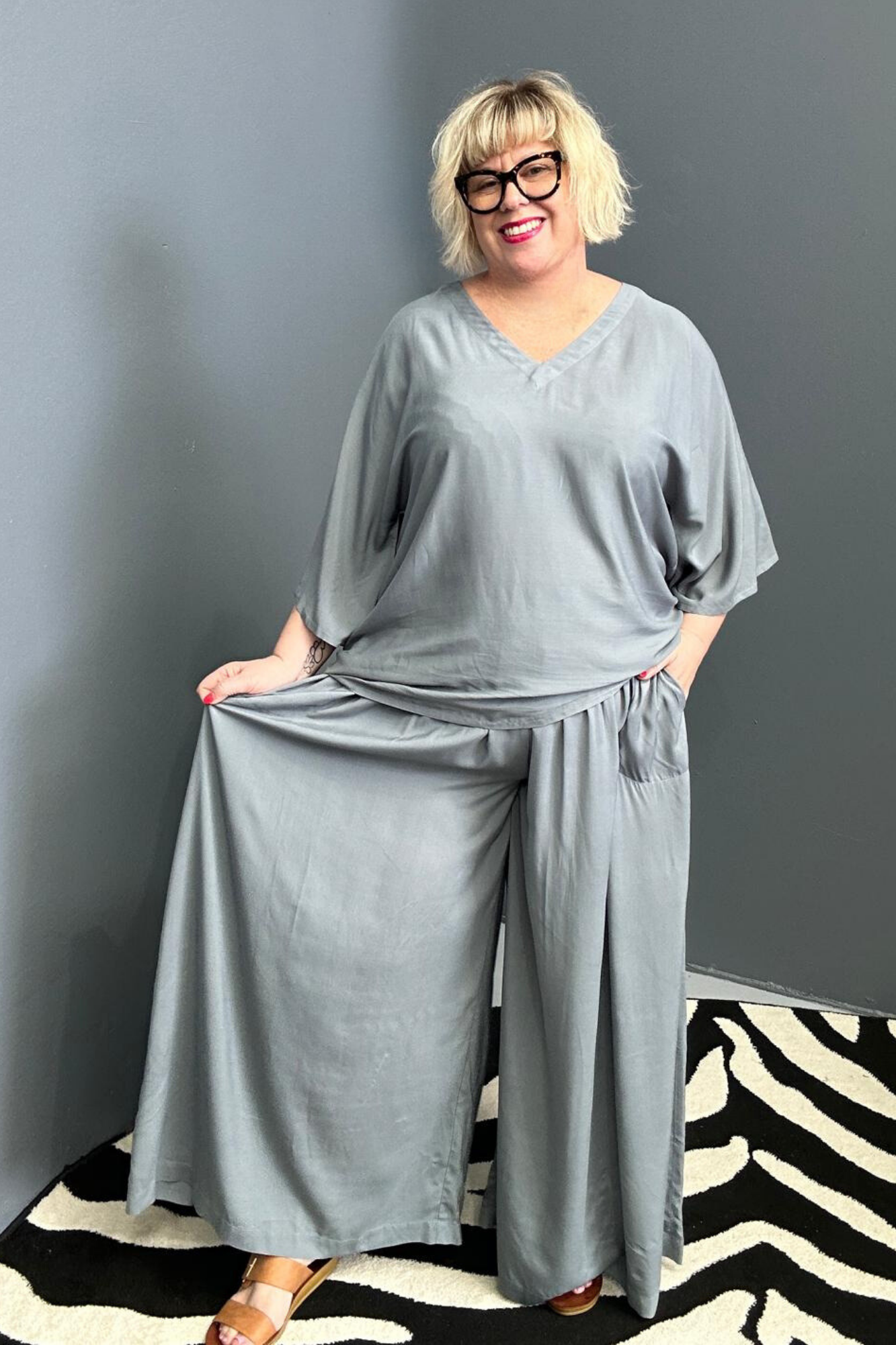 Flowy palazzo pants in a calming sage hue.
