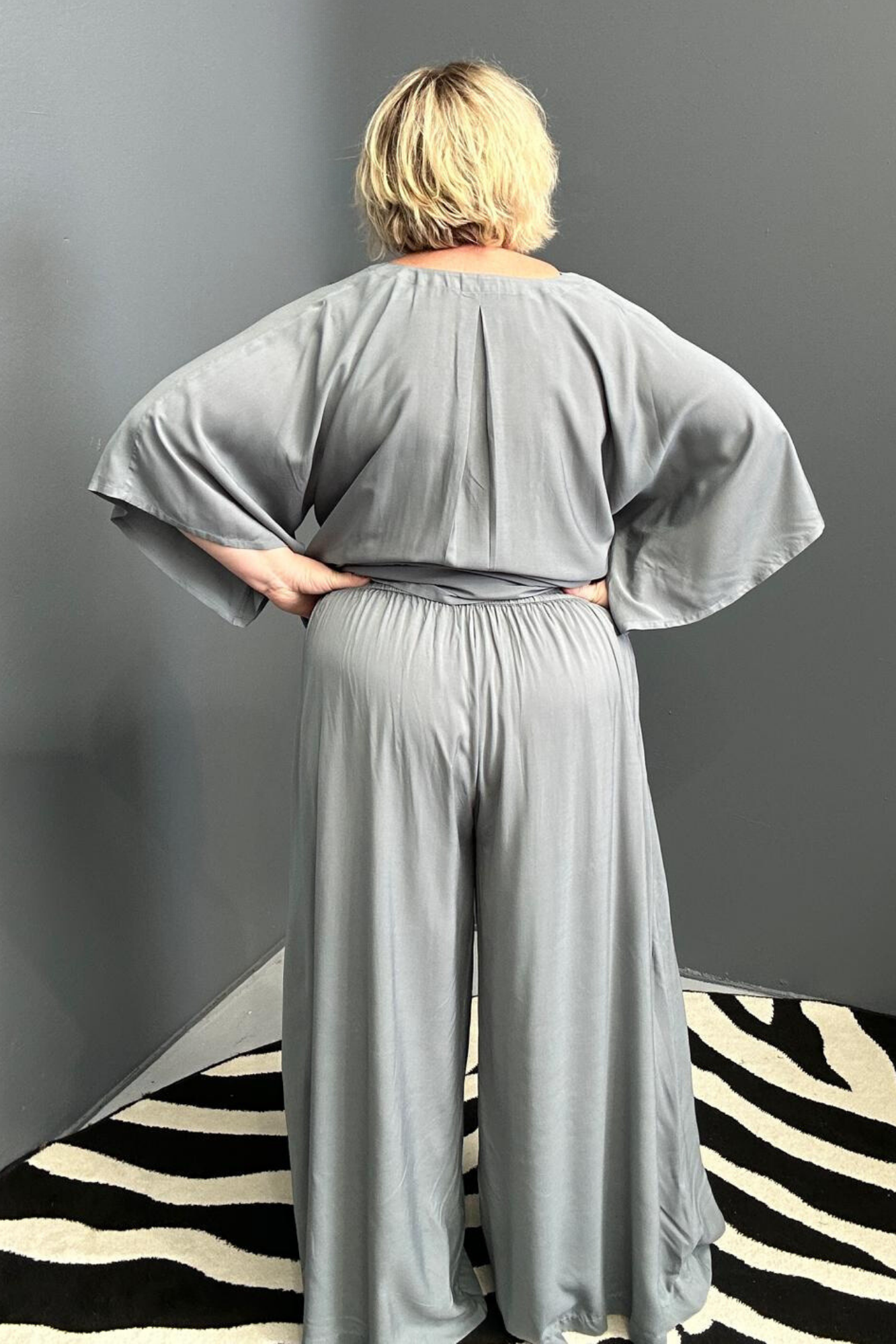 Flowy palazzo pants in a calming sage hue.