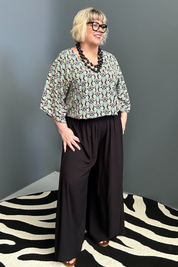 Flowy palazzo pants in a sleek black design.