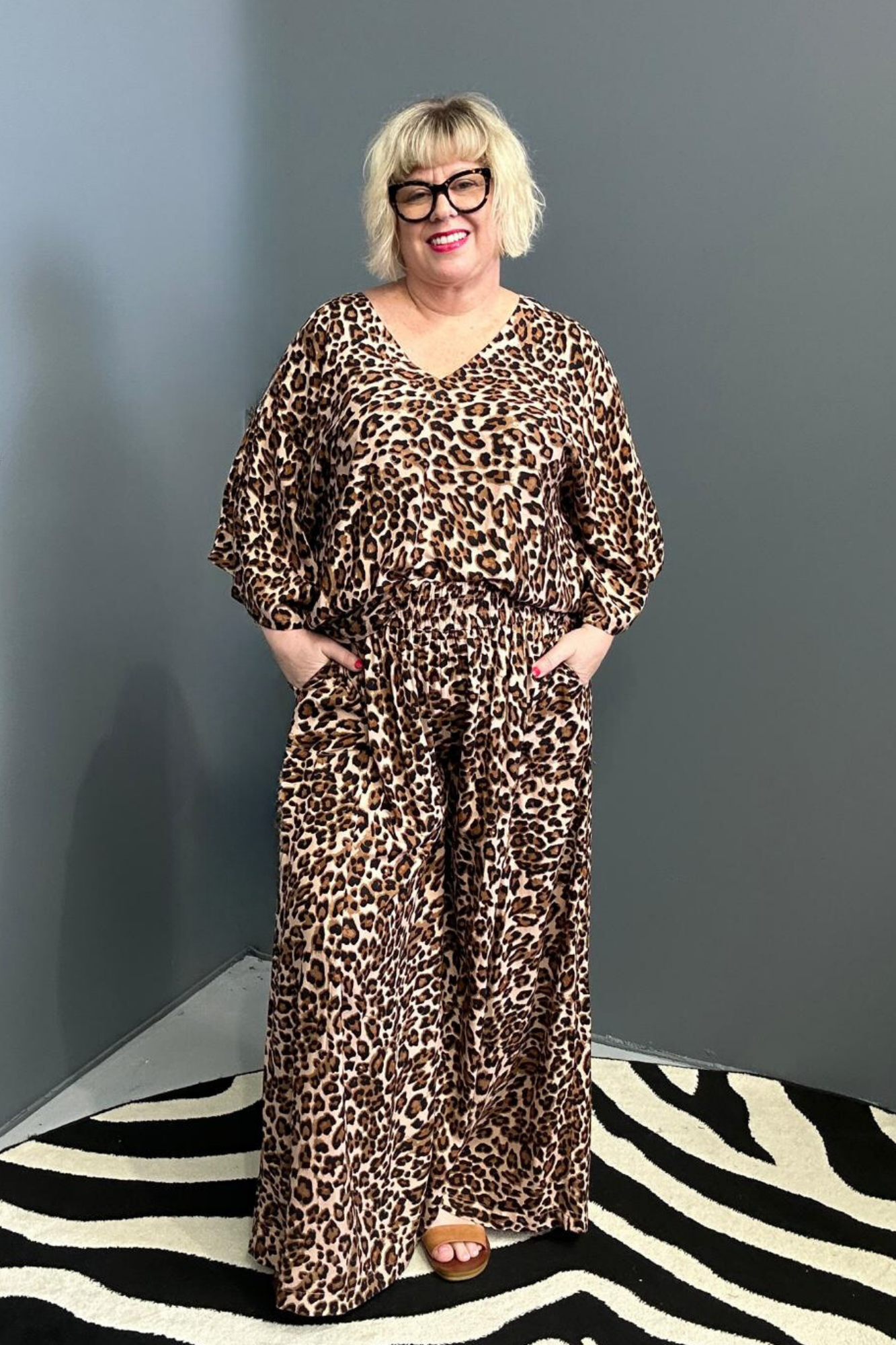 Flowy palazzo pants with a bold leopard print.