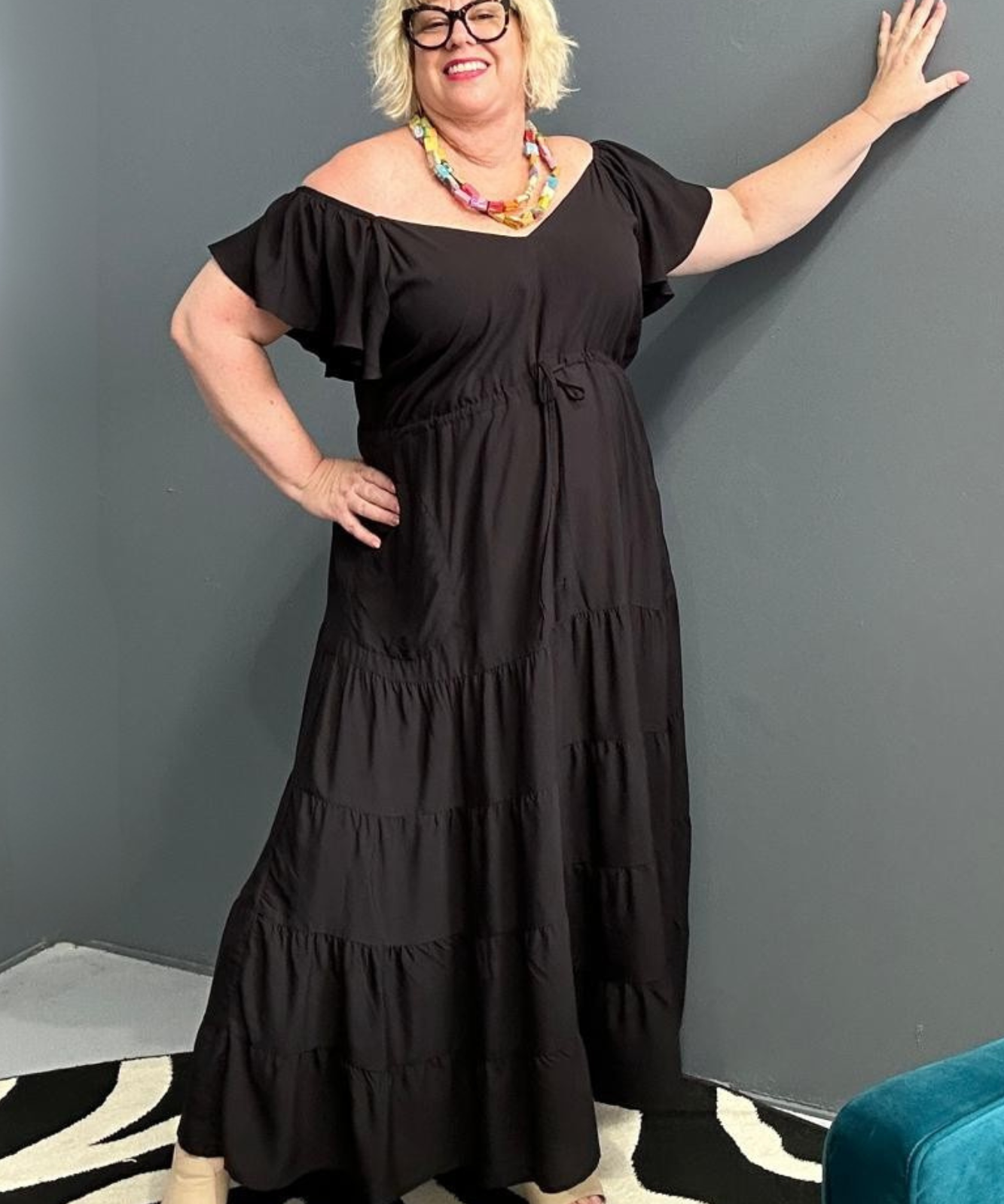 Flowy plus-size rayon maxi dress in a timeless black hue.