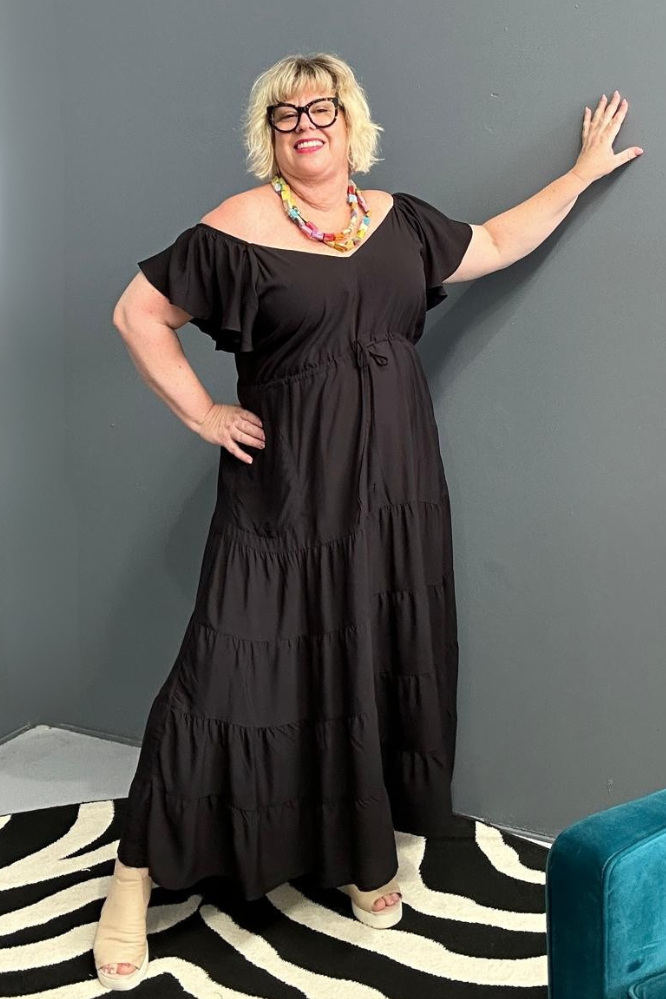 Flowy plus-size rayon maxi dress in a timeless black hue.