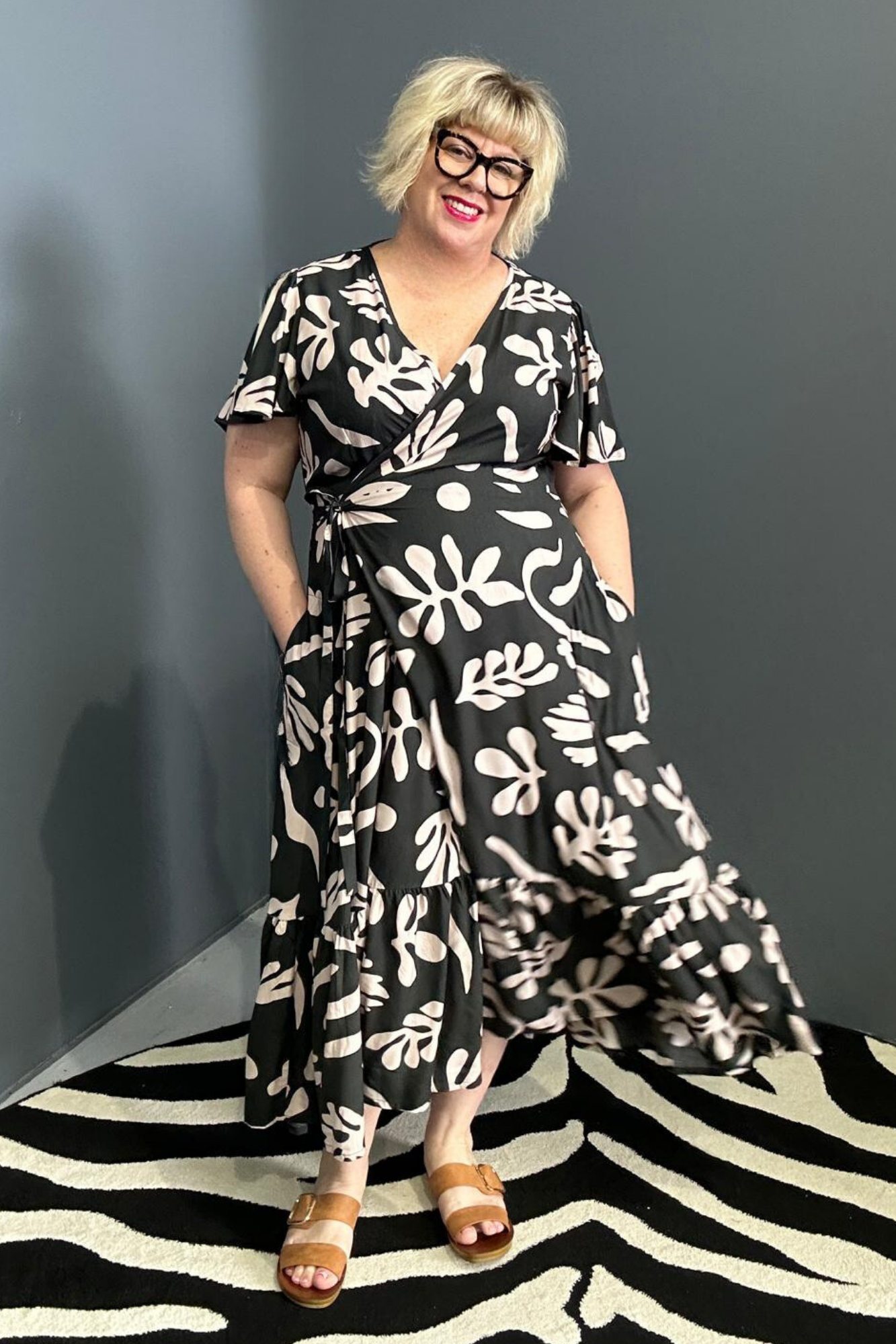 Flattering plus-size wrap dress in black and creme.