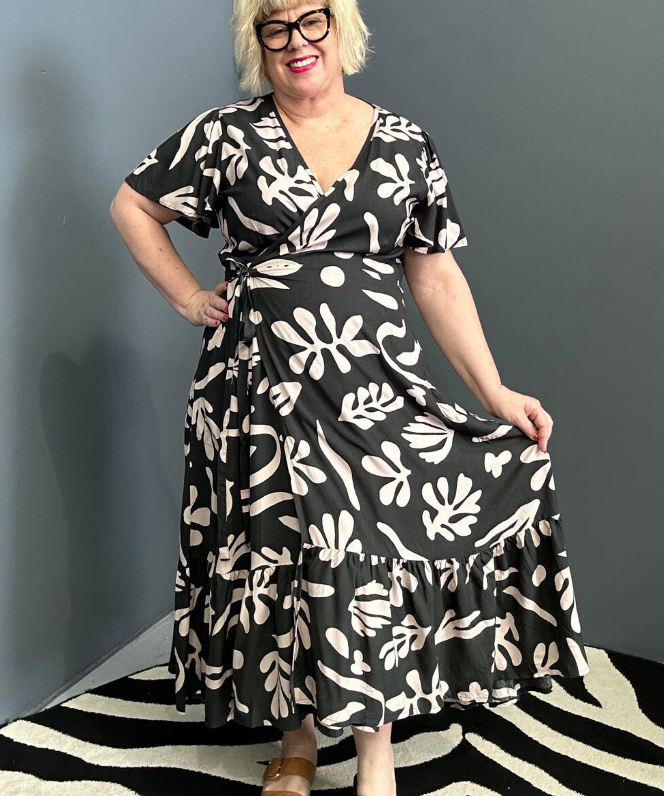 Flattering plus-size wrap dress in black and creme.