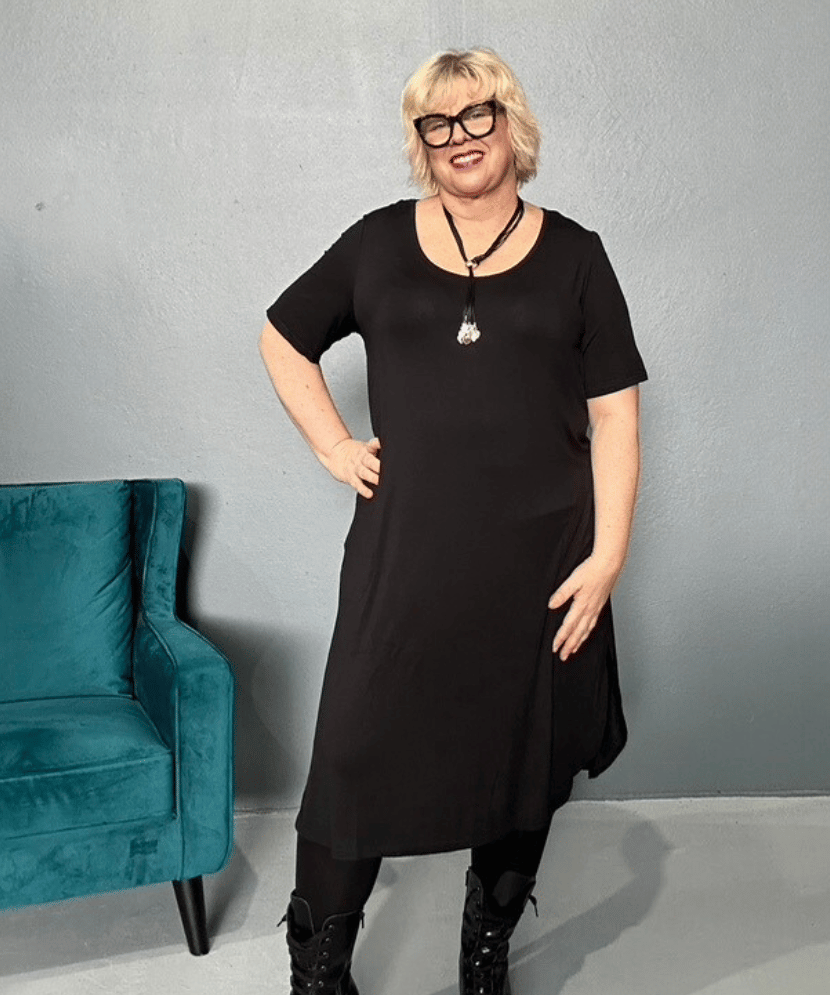  'Alana' T-Shirt Dress with a comfortable top and flattering silhouette, perfect for daytime wear and versatile styling.