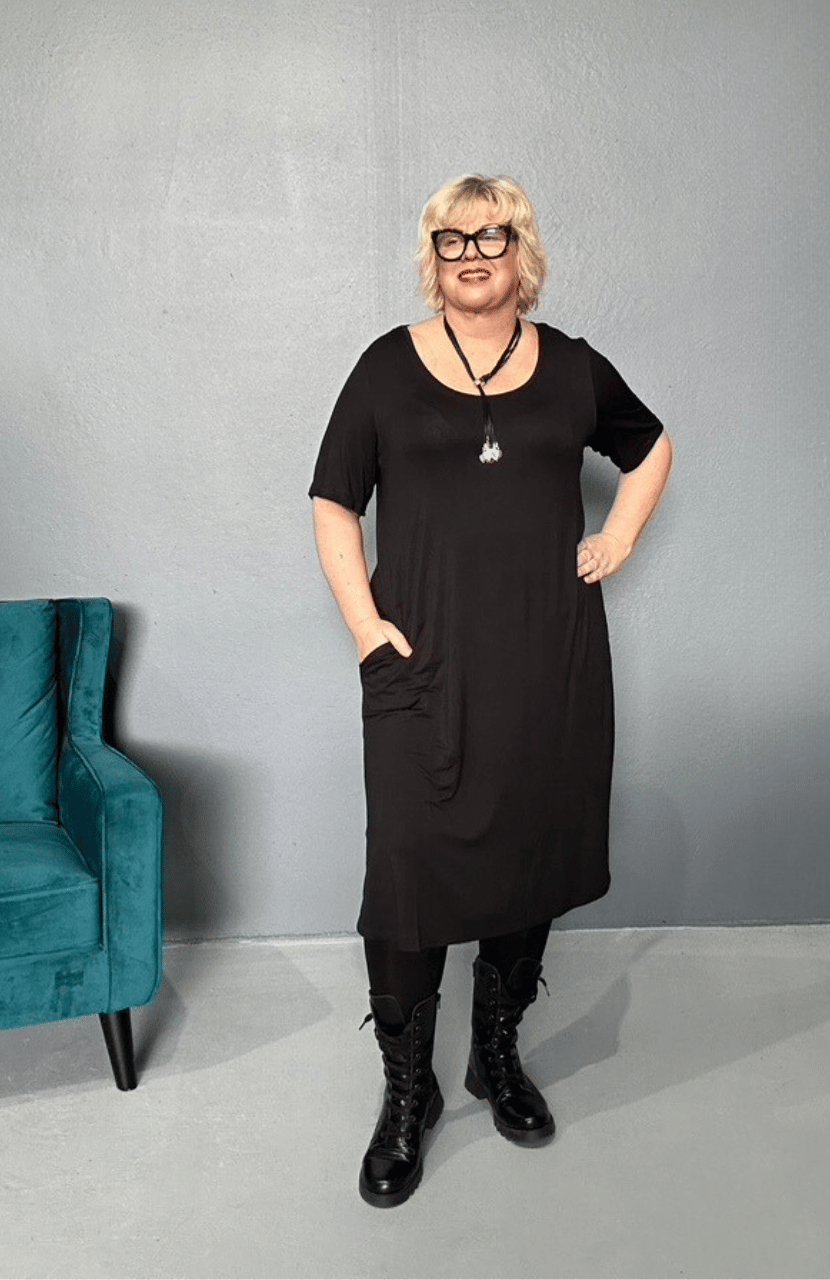  'Alana' T-Shirt Dress with a comfortable top and flattering silhouette, perfect for daytime wear and versatile styling.