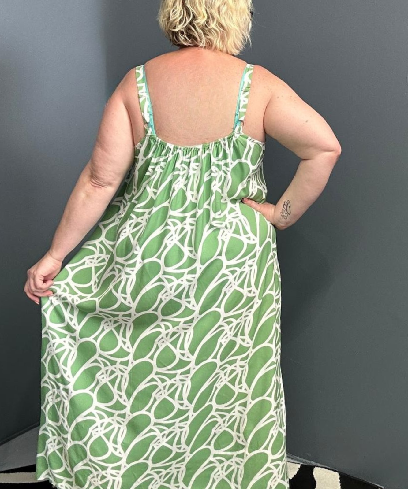 Plus-size green singlet dress with a soft, breathable fit.