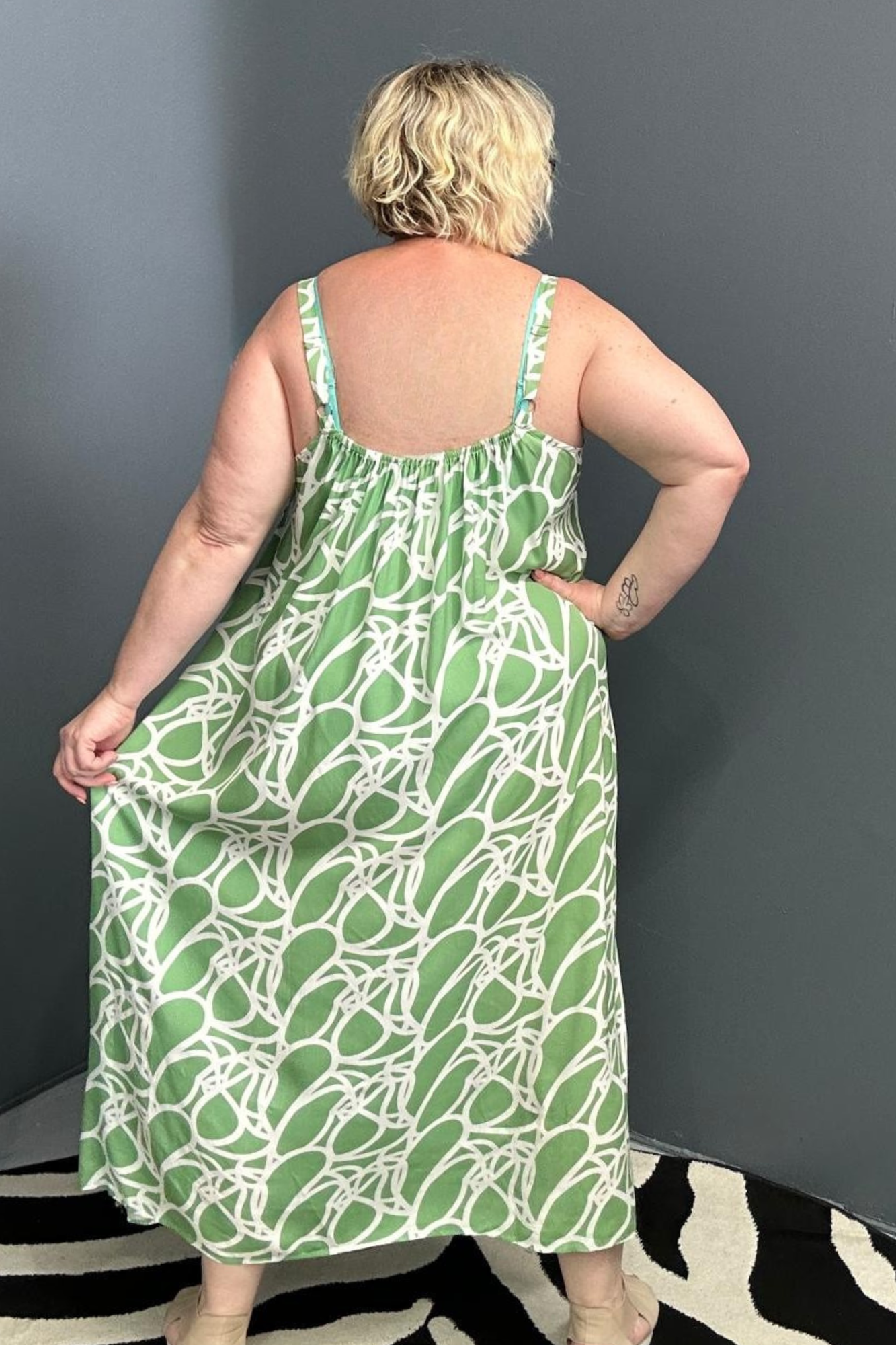 Plus-size green singlet dress with a soft, breathable fit.