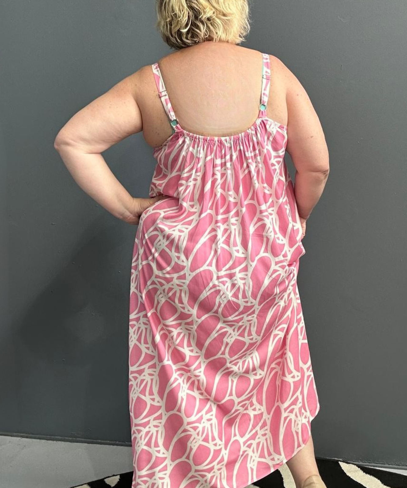 Plus-size pink singlet dress with a soft, breathable fit.