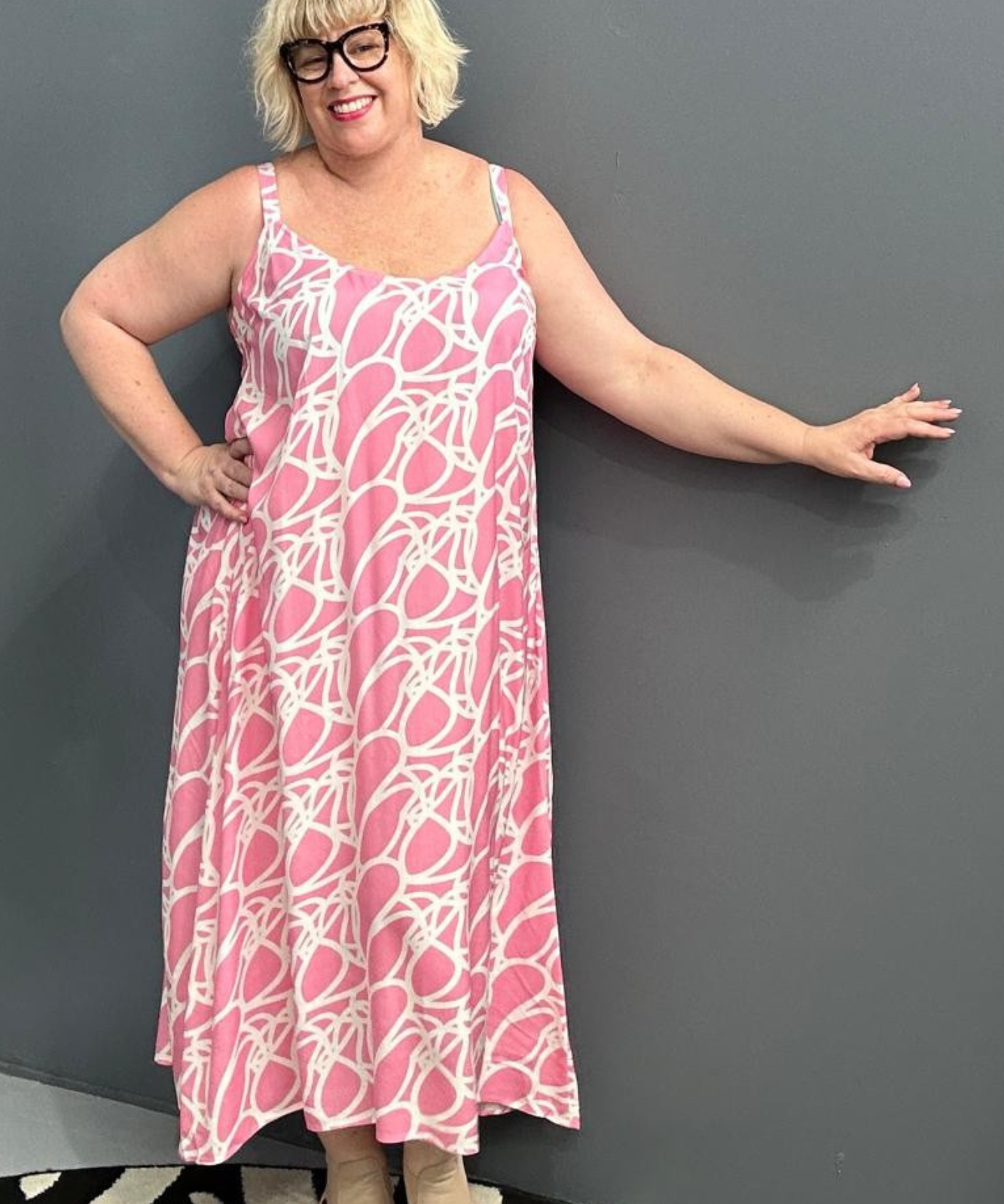 Plus-size pink singlet dress with a soft, breathable fit.