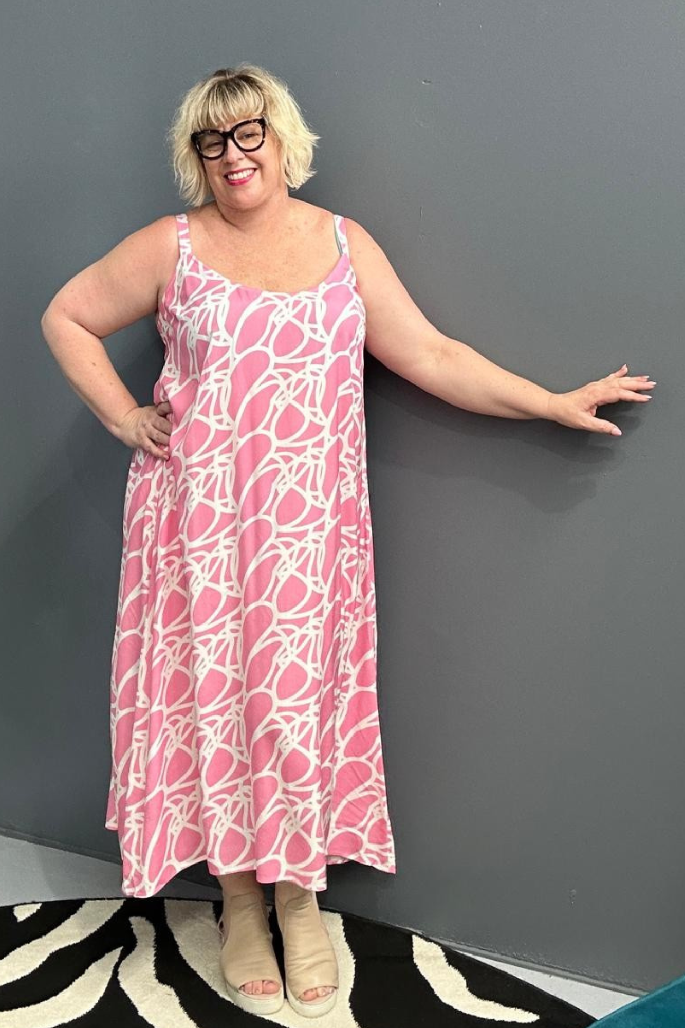 Plus-size pink singlet dress with a soft, breathable fit.