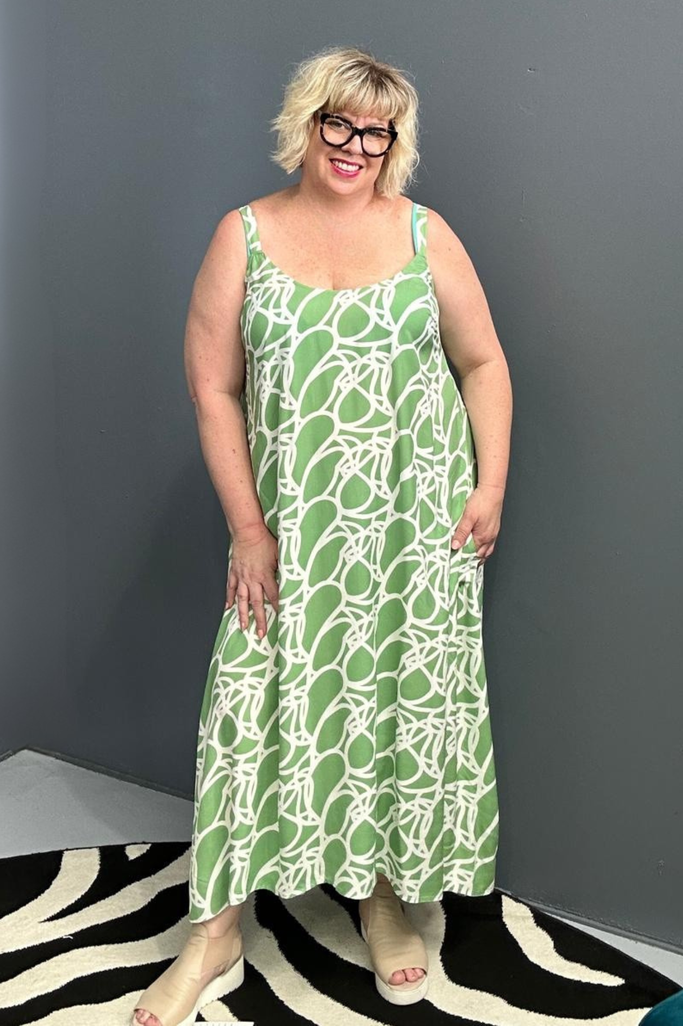 Plus-size green singlet dress with a soft, breathable fit.
