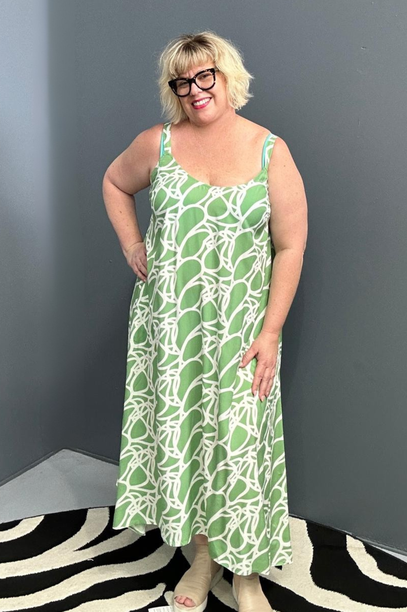 Plus-size green singlet dress with a soft, breathable fit.