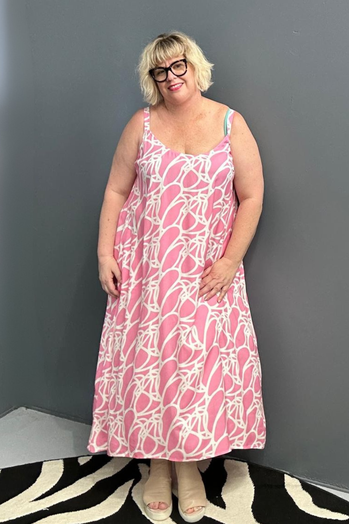 Plus-size pink singlet dress with a soft, breathable fit.