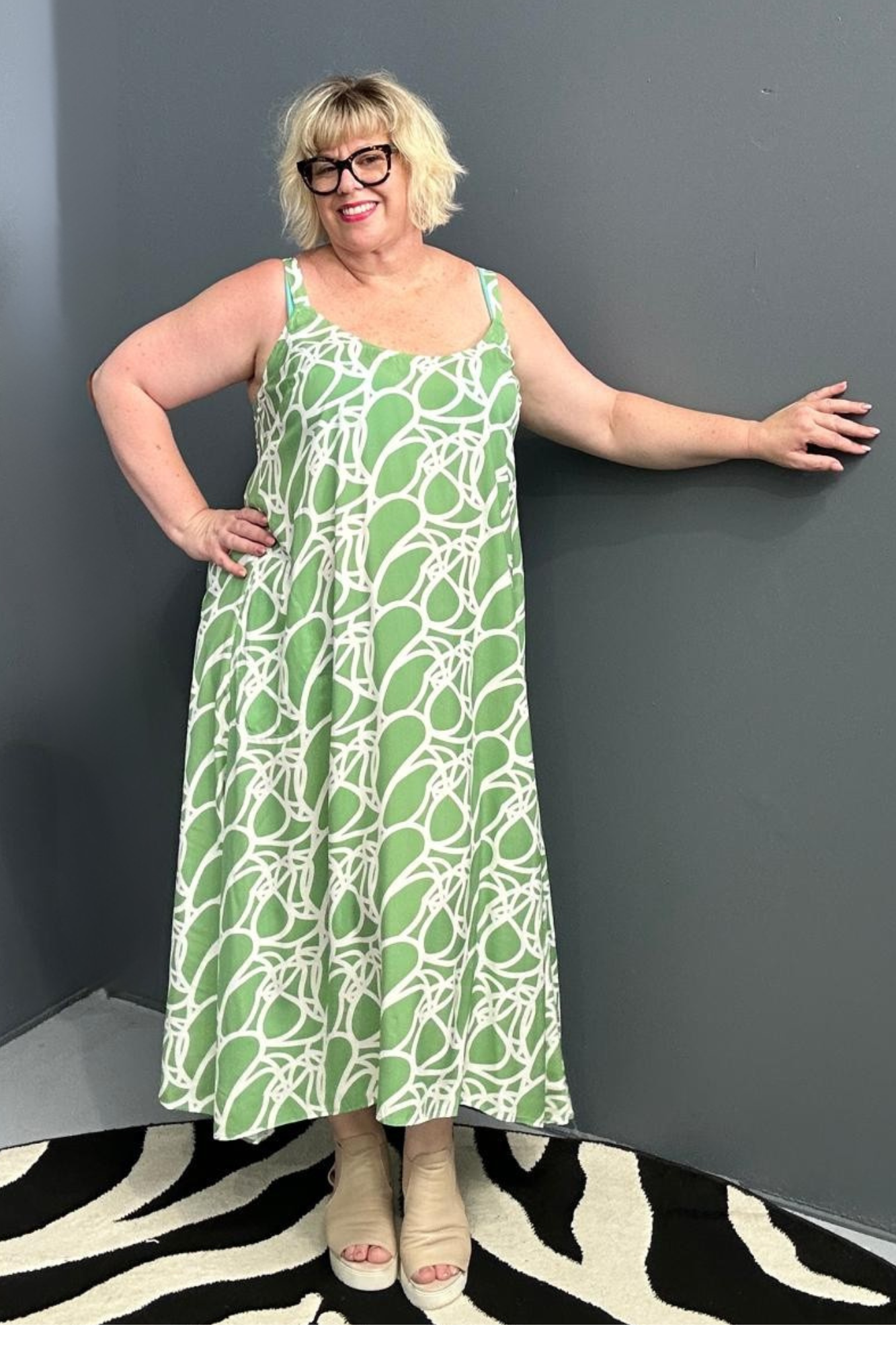 Plus-size green singlet dress with a soft, breathable fit.