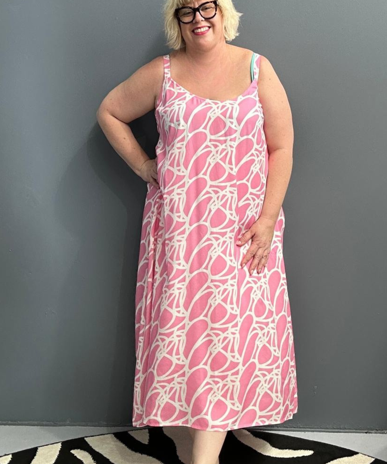 Plus-size pink singlet dress with a soft, breathable fit.