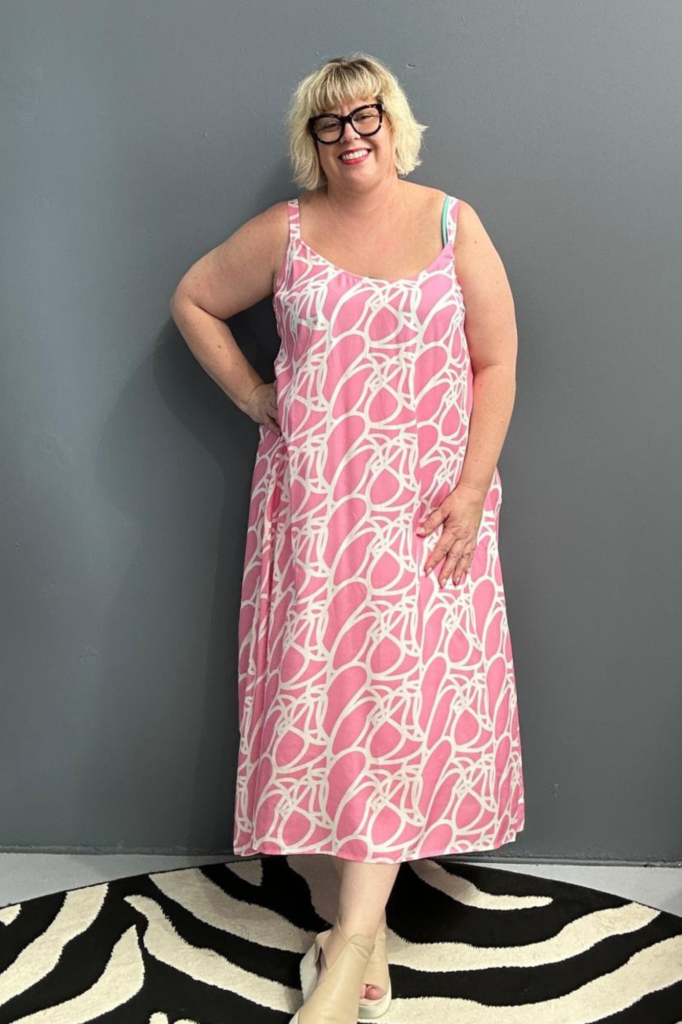 Plus-size pink singlet dress with a soft, breathable fit.