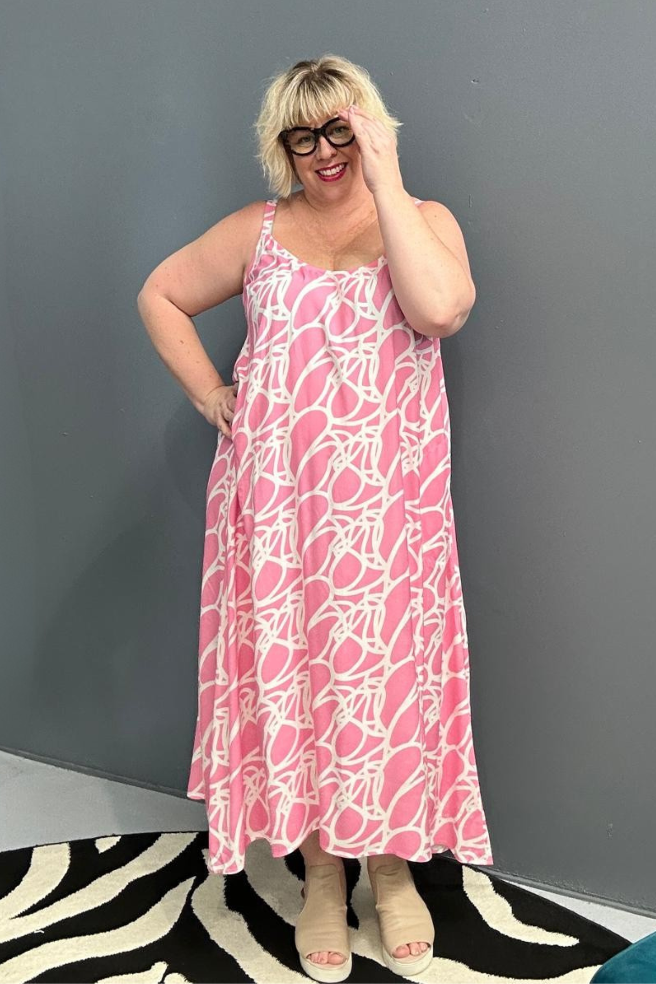 Plus-size pink singlet dress with a soft, breathable fit.