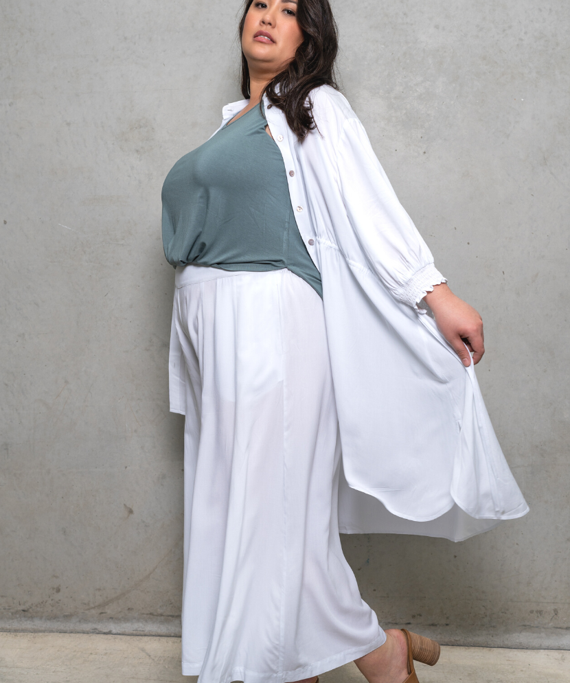 Sassy drawstring top in painter smock style, versatile for day or night wear. Perfect for plus size clothing.