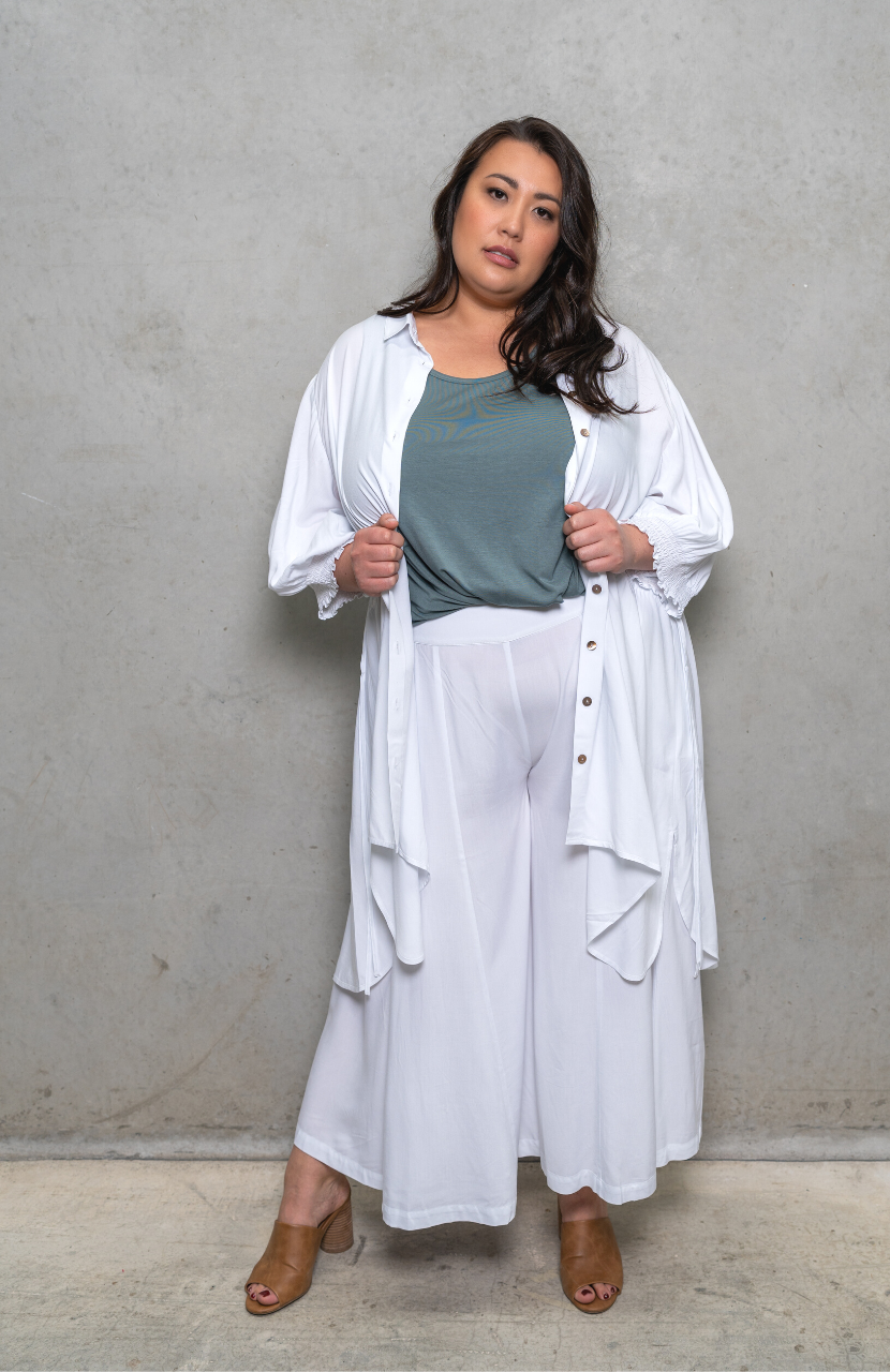 Sassy drawstring top in painter smock style, versatile for day or night wear. Perfect for plus size clothing.