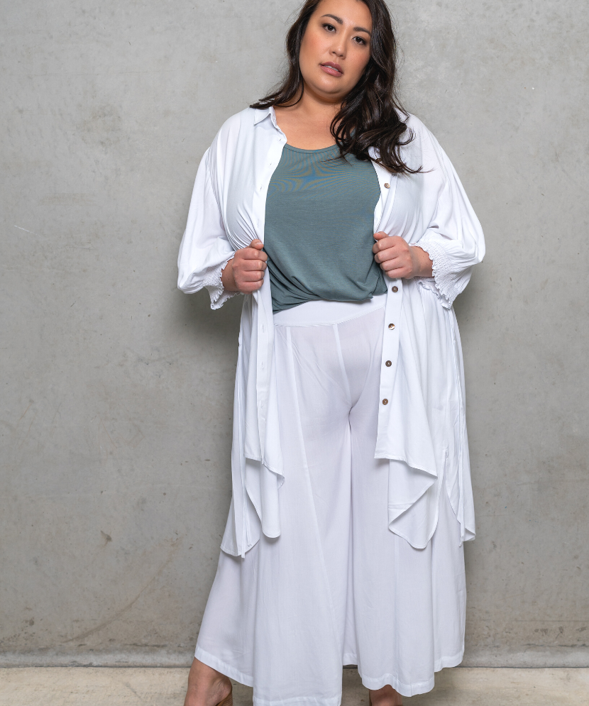 Sassy drawstring top in painter smock style, versatile for day or night wear. Perfect for plus size clothing.