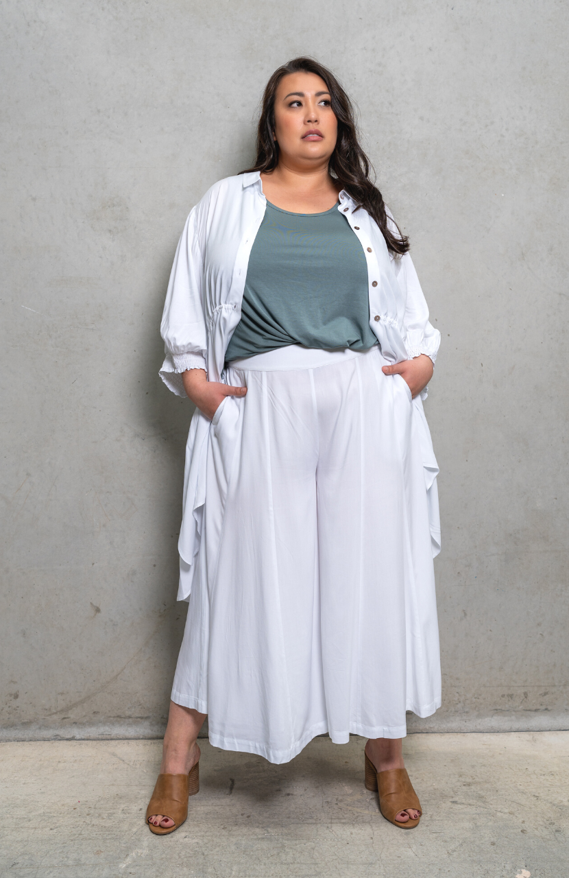 Sassy drawstring top in painter smock style, versatile for day or night wear. Perfect for plus size clothing.