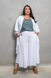 Sassy drawstring top in painter smock style, versatile for day or night wear. Perfect for plus size clothing.