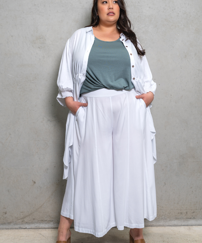 Sassy drawstring top in painter smock style, versatile for day or night wear. Perfect for plus size clothing.