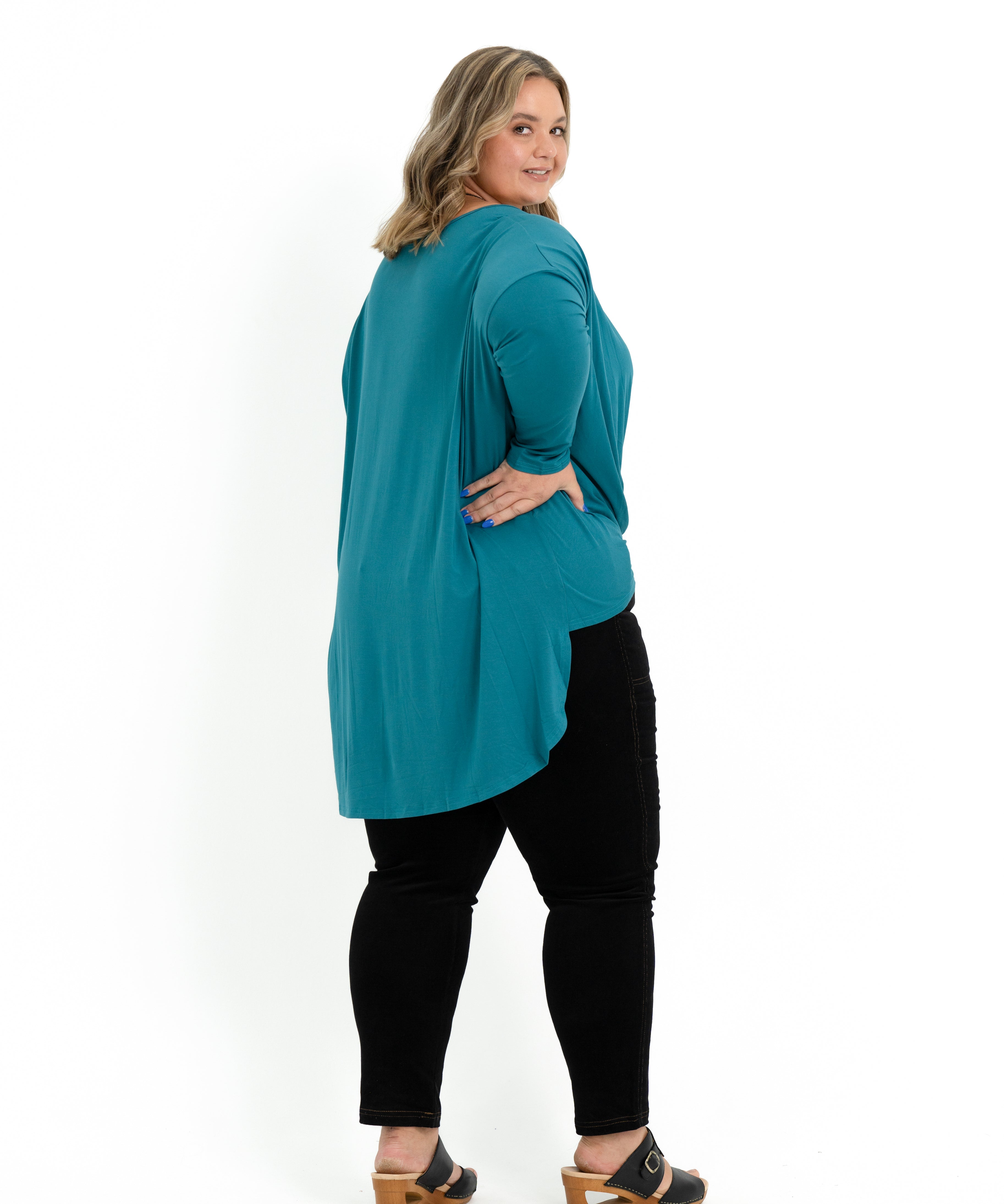 Teal bamboo twist front top for plus size women with long sleeves and a boat neckline.