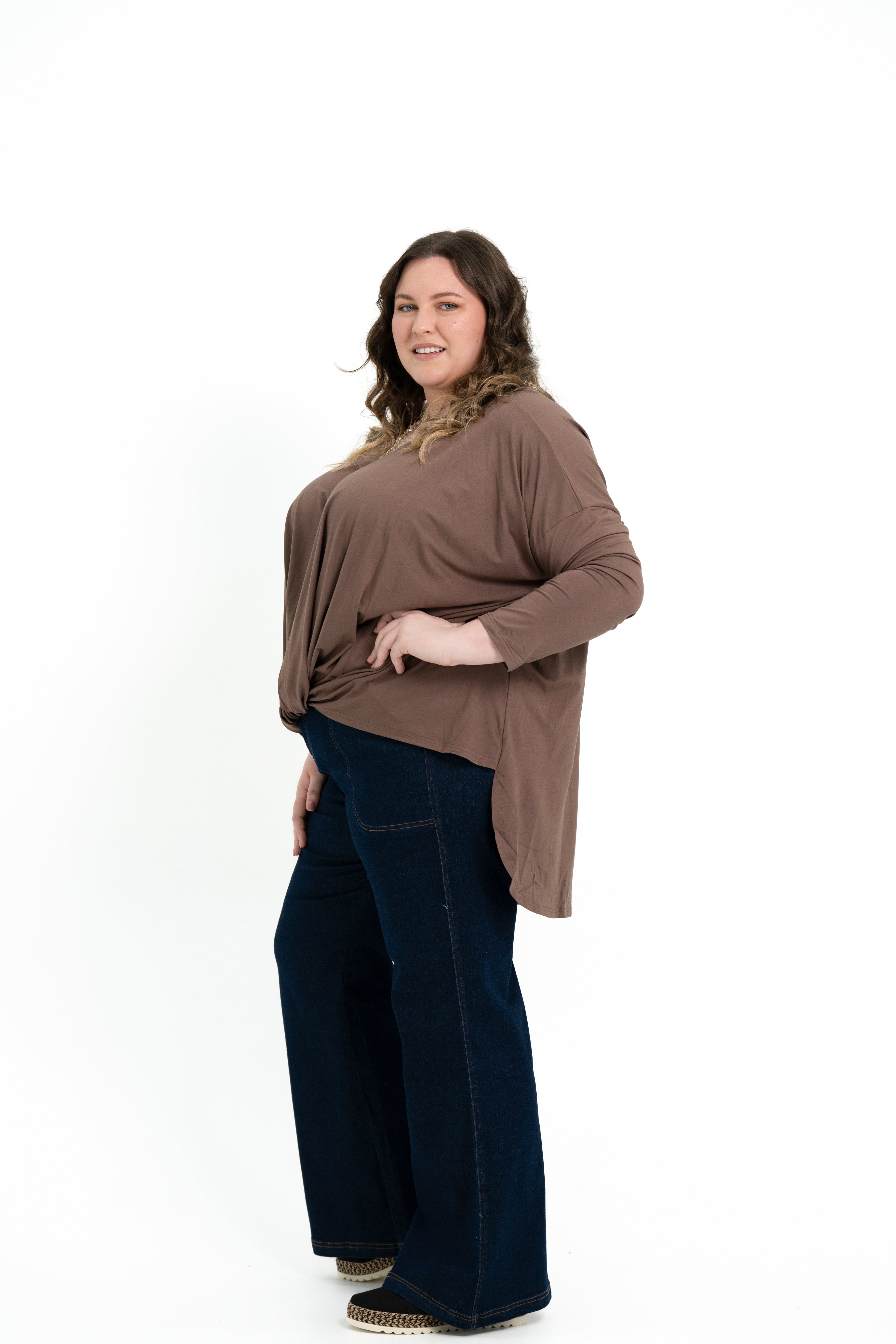 Teal bamboo twist front top with long sleeves, boat neckline, and soft drape for plus size women.