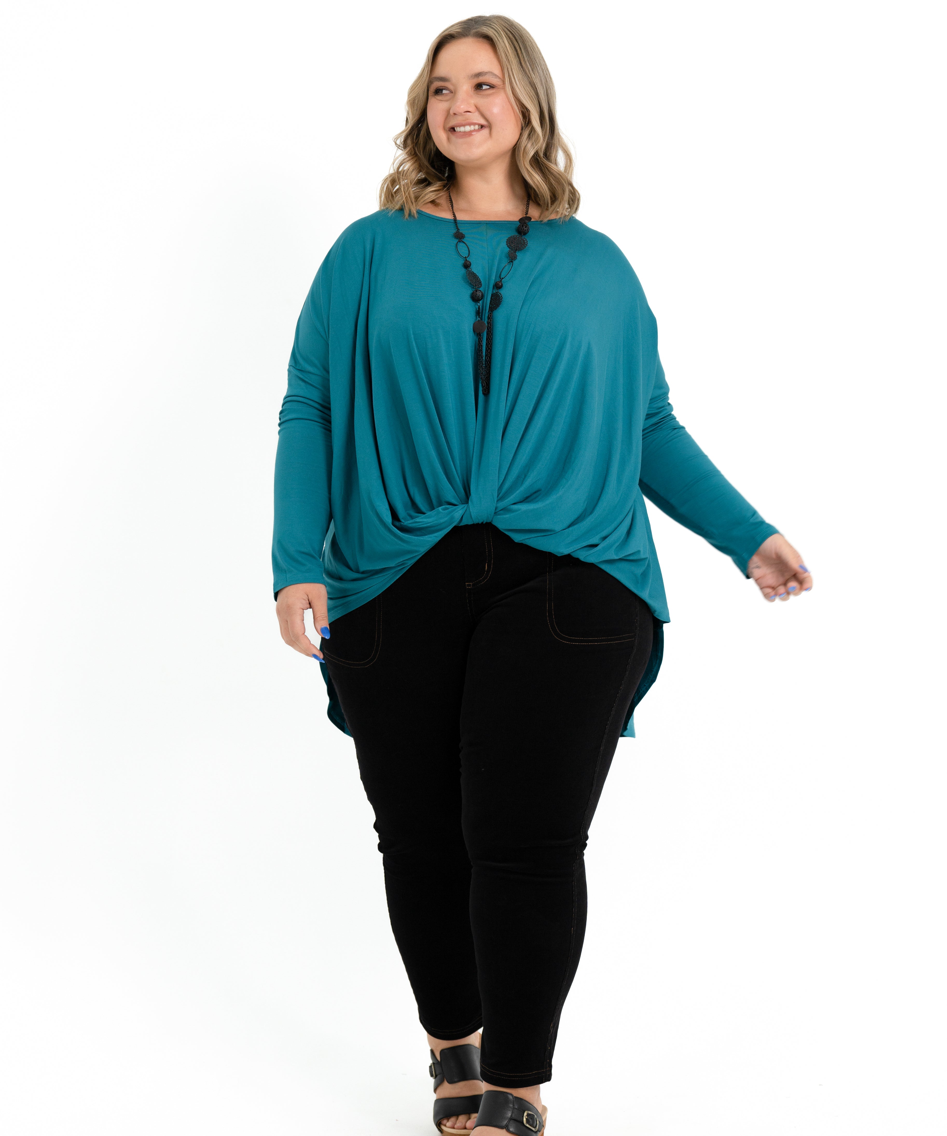 Teal bamboo twist front top for plus size women with long sleeves and a boat neckline.