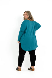 Teal bamboo twist front top for plus size women with long sleeves and a boat neckline.
